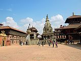 Kathmandu Bhaktapur 01-2 Bhaktapur Durbar Square With Golden Gate and Palace of 55 Windows on Left, King Bhupatindra Malla Column, Teleju Bell, Vatsala Durga Temple In Middle, Pashupatinath Temple On Right 